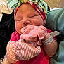 newborn, baby, sleeping, mittens, headband, floral, pink_clothing, hospital_bracelet, closeup, infant, hand, person, cute, soft, rest, cozy, toddler, child, face, portrait