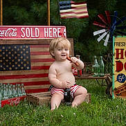 Jasper joined the competition — help win amazing prizes! american_flag, beverage, bottle, child, coca_cola, crate, food, grass, hot_dog, nostalgia, outdoor, patriotic, playful, portrait, red_white_blue, shorts, smile, summer, toddler, vintage_sign