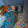 baby, blanket, bed, bedding, blue, brown_toy, child, cuddling, easter_theme, fabric, pillow, plush_toy, playpen, sleeping, soft_toy, toy, toddler, colorful, animal_print, indoors
