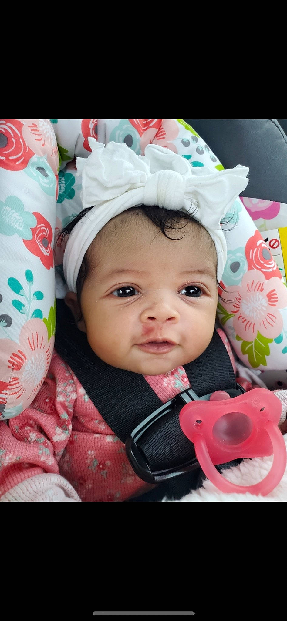 Blakely is registered to the contest to win money with this photo: baby, baby_toddler_clothing, cheek, eyebrow, eyelash, facial_expression, happy, headgear, iris, lip, mouth, nose, outerwear, person, pink, product, skin, sleeve, smile, textile