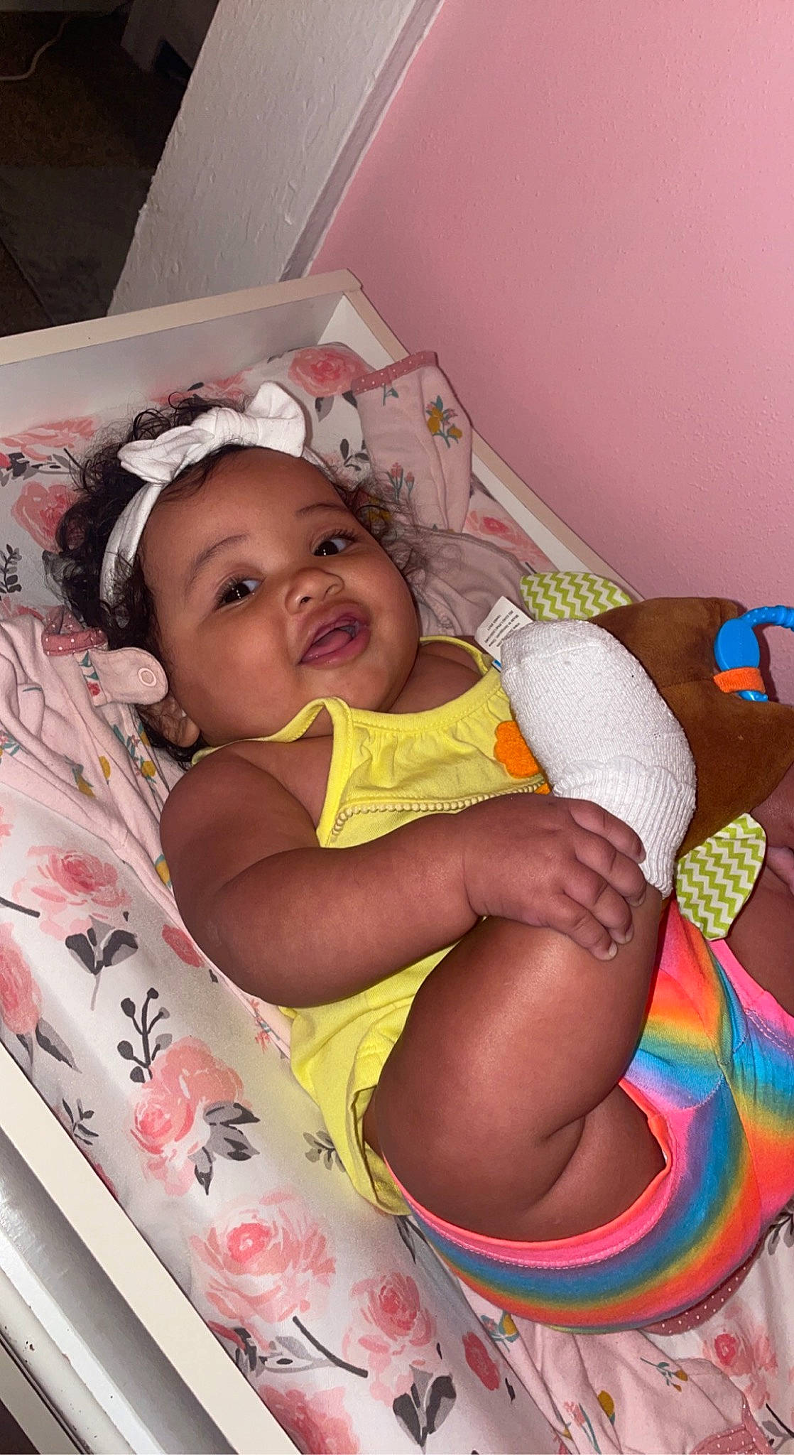 Blakely joined the competition — help win amazing prizes! baby, baby_toddler_clothing, cheek, child, comfort, eye, face, facial_expression, finger, fun, happy, head, headwear, mouth, person, pink, skin, smile, sock, textile