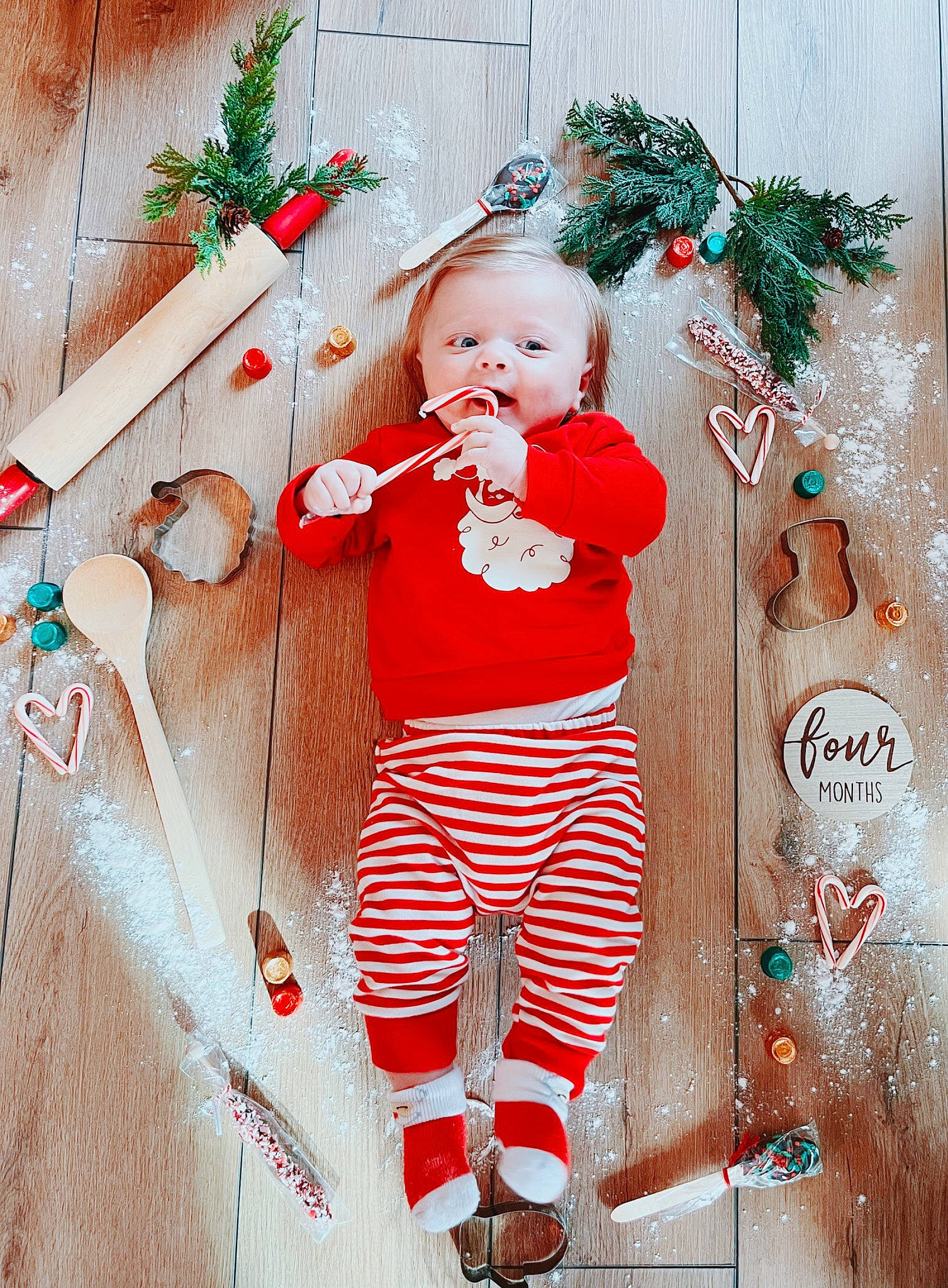 Reagan is registered to the contest to win money with this photo: baby_toddler_clothing, child, christmas, christmas_decoration, christmas_eve, christmas_ornament, event, happy, holiday, holiday_ornament, mammal, orange, ornament, person, plant, standing, textile, toddler, twig, vertebrate