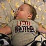 baby, sleeping, pacifier, shirt, little_brother, blanket, bed, sheet, ghost, moon, halloween, child, face, arm, cute, indoors, resting, soft_lighting, toddler, clothing