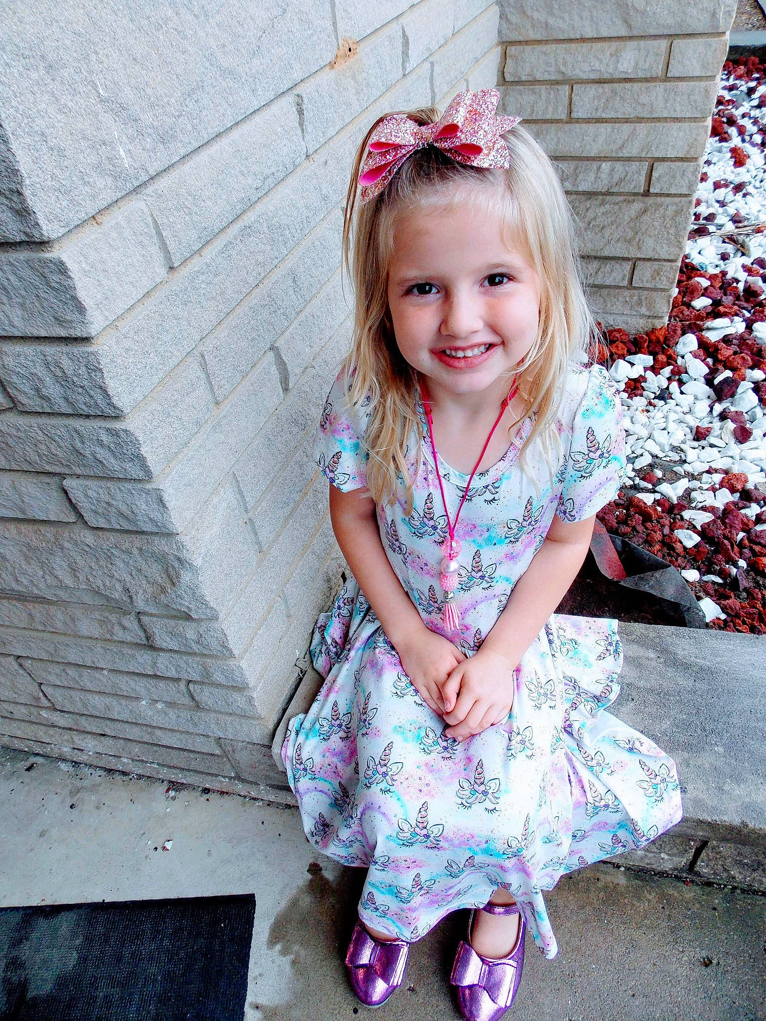 Harmony is registered to the contest to win money with this photo: beauty, blond, child, child_model, design, dress, eye, face, footwear, joy, pattern, people, person, photograph, pink, purple, skin, smile, snapshot, summer