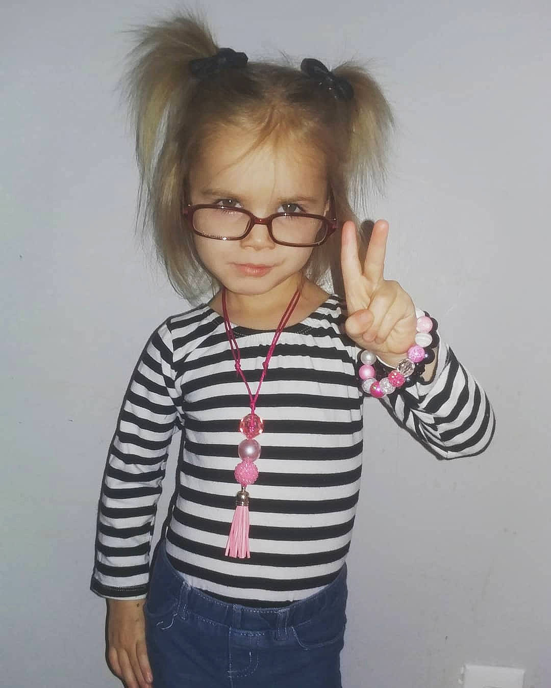 Anika joined the competition — help win amazing prizes! blond, cheek, child, cool, eyewear, fun, gesture, glasses, hair, outerwear, person, shoulder, sleeve, t_shirt, toddler, top, vision_care