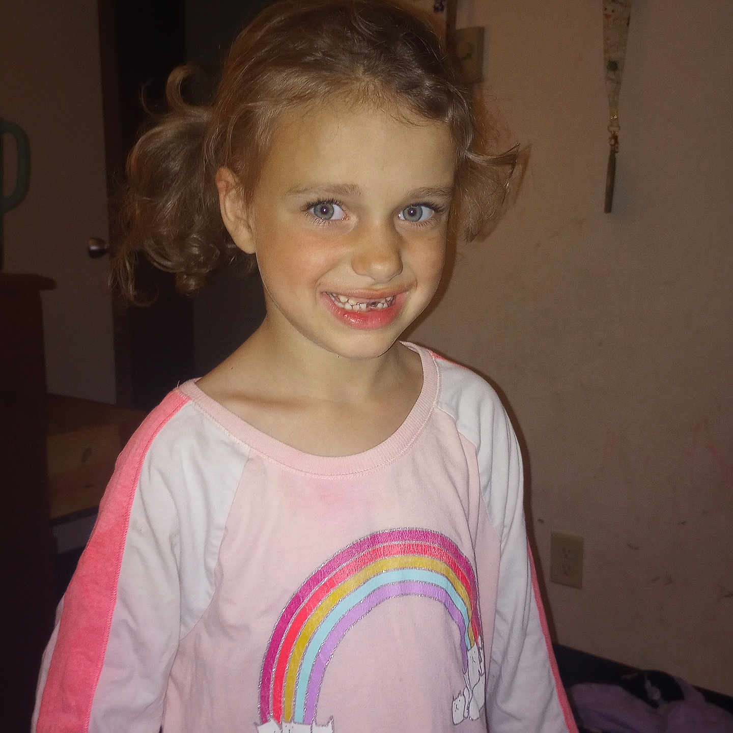 Charlotte joined the competition — help win amazing prizes! child, girl, smile, indoor, pink_shirt, rainbow, cats, pigtails, curly_hair, happy, portrait, young, casual_clothing, face, person, cute, childhood, apparel, room, wall