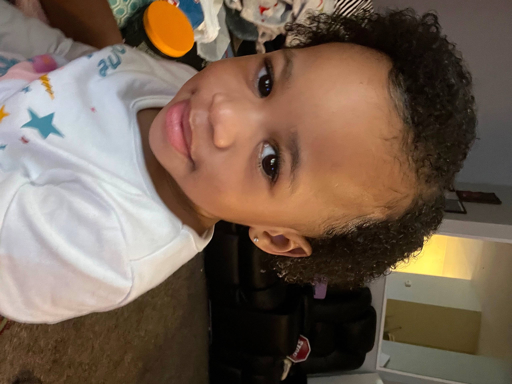 Aviana is registered to the contest to win money with this photo: baby, baby_toddler_clothing, cheek, child, ear, eyelash, forehead, fun, happy, hat, lip, mouth, nose, person, plastic_bottle, skin, smile, toddler, water, water_bottle