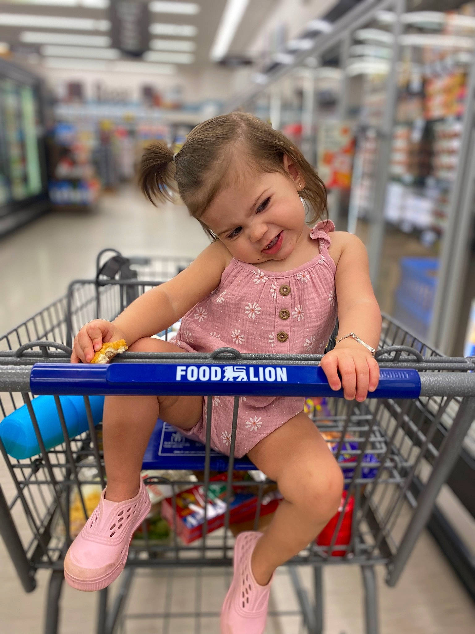 Payton joined the competition — help win amazing prizes! chin, dress, facial_expression, finger, footwear, hairstyle, happy, joint, leg, leisure, person, shopping_cart, shorts, shoulder, skin, smile, standing, thigh, tire, toddler