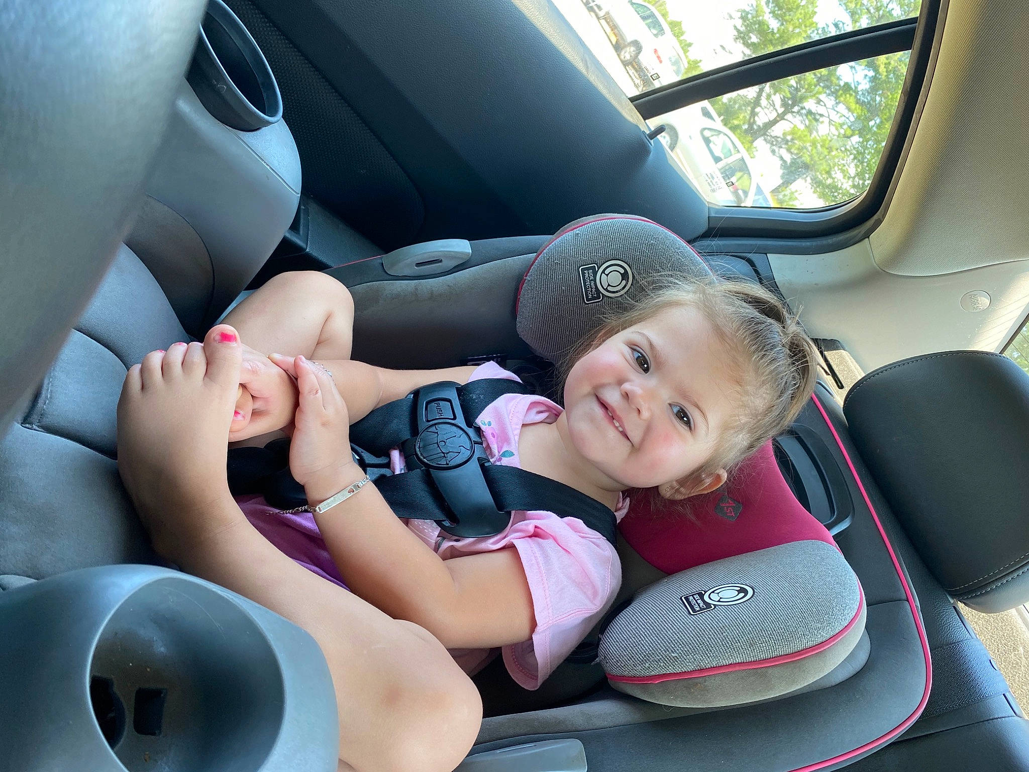 Payton joined the competition — help win amazing prizes! automotive_design, automotive_exterior, automotive_wheel_system, car, car_seat, car_seat_cover, comfort, finger, head_restraint, joy, light, motor_vehicle, person, personal_luxury_car, product, smile, steering_part, steering_wheel, toddler, vehicle