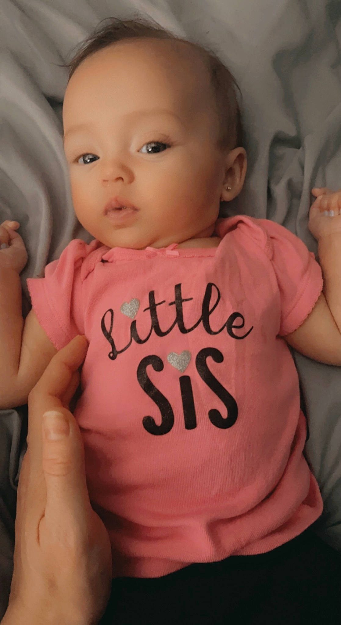 Ensley is registered to the contest to win money with this photo: baby_toddler_clothing, cheek, chin, eye, eyebrow, eyelash, face, forehead, hand, head, joint, lip, mouth, muscle, neck, nose, person, shoulder, skin, sleeve