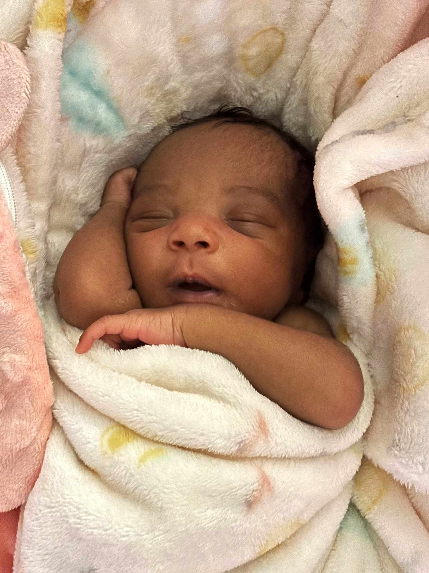 Tiera is registered to the contest to win money with this photo: baby, newborn, sleeping, blanket, soft, arm, peaceful, infant, wrapped, cute, child, face, skin, relaxation, closeup, portrait, cozy, indoors, comfort, rest