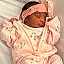 Tiera is registered to the contest to win money with this photo: newborn, baby, sleeping, pink, headband, strawberry, clothing, infant, cute, cozy, soft, portrait, peaceful, child, sleep, bed, pajamas, person, rest, young