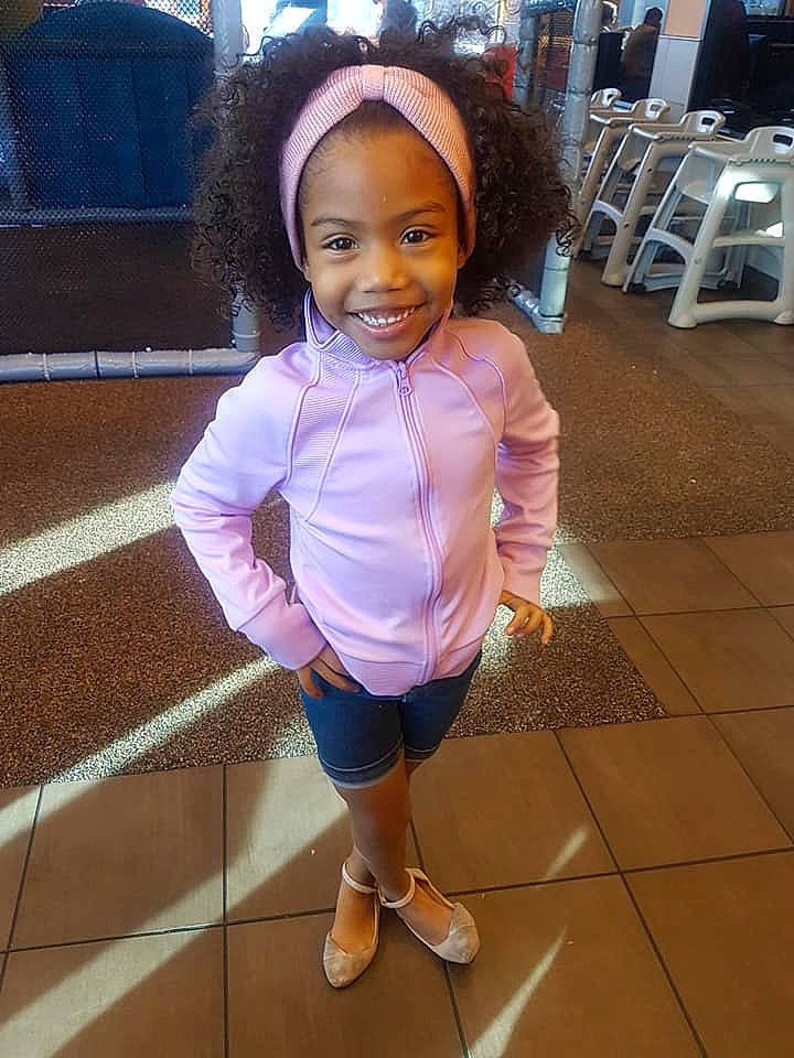 Zoe Guerrero is registered to the contest to win money with this photo: abdomen, beauty, child, cool, day, fun, girl, human, joy, material, person, pink, product, purple, shoe, shoulder, skin, smile, standing, textile