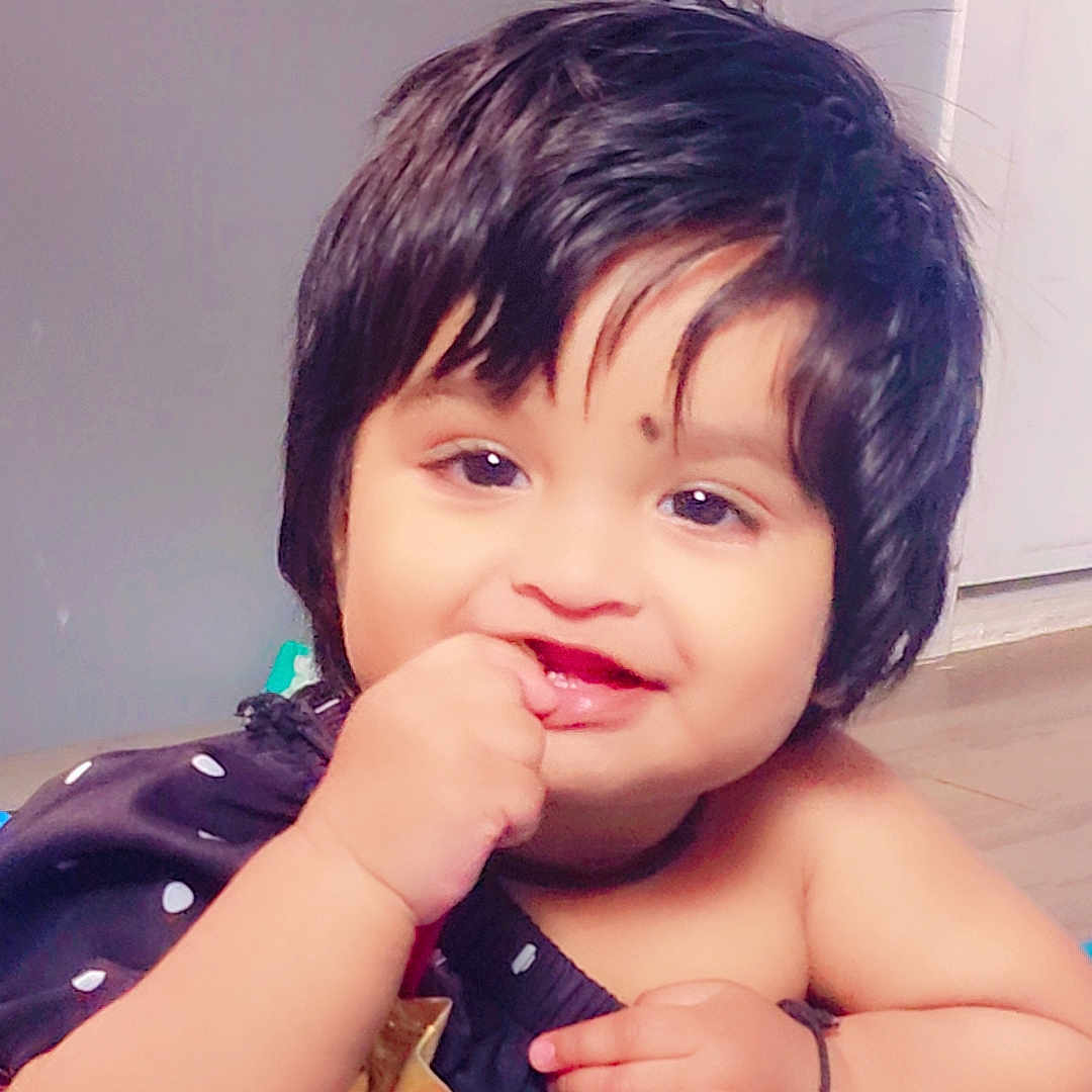 Keny joined the competition — help win amazing prizes! baby, blanket, cheeks, child, clothing, cute, eyes, face, finger, floor, hair, hand, happy, indoor, infant, polka_dot, portrait, skin, smiling, toddler