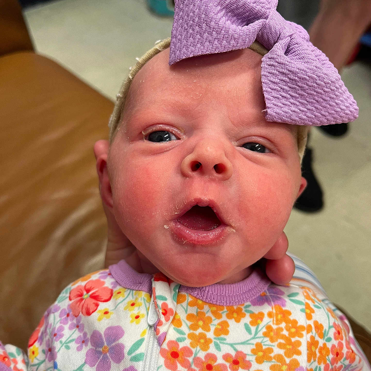 Lillee joined the competition — help win amazing prizes! accessories, baby, beanie, bodypart, bonnet, cap, clothing, couch, face, finger, furniture, hand, hat, head, headband, newborn, person, photography, portrait, purple