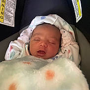Alìze joined the competition — help win amazing prizes! baby, newborn, sleeping, car_seat, blanket, mittens, face, infant, cozy, child, warning_label, soft, cute, peaceful, resting, indoor, portrait, clothing, closeup, head