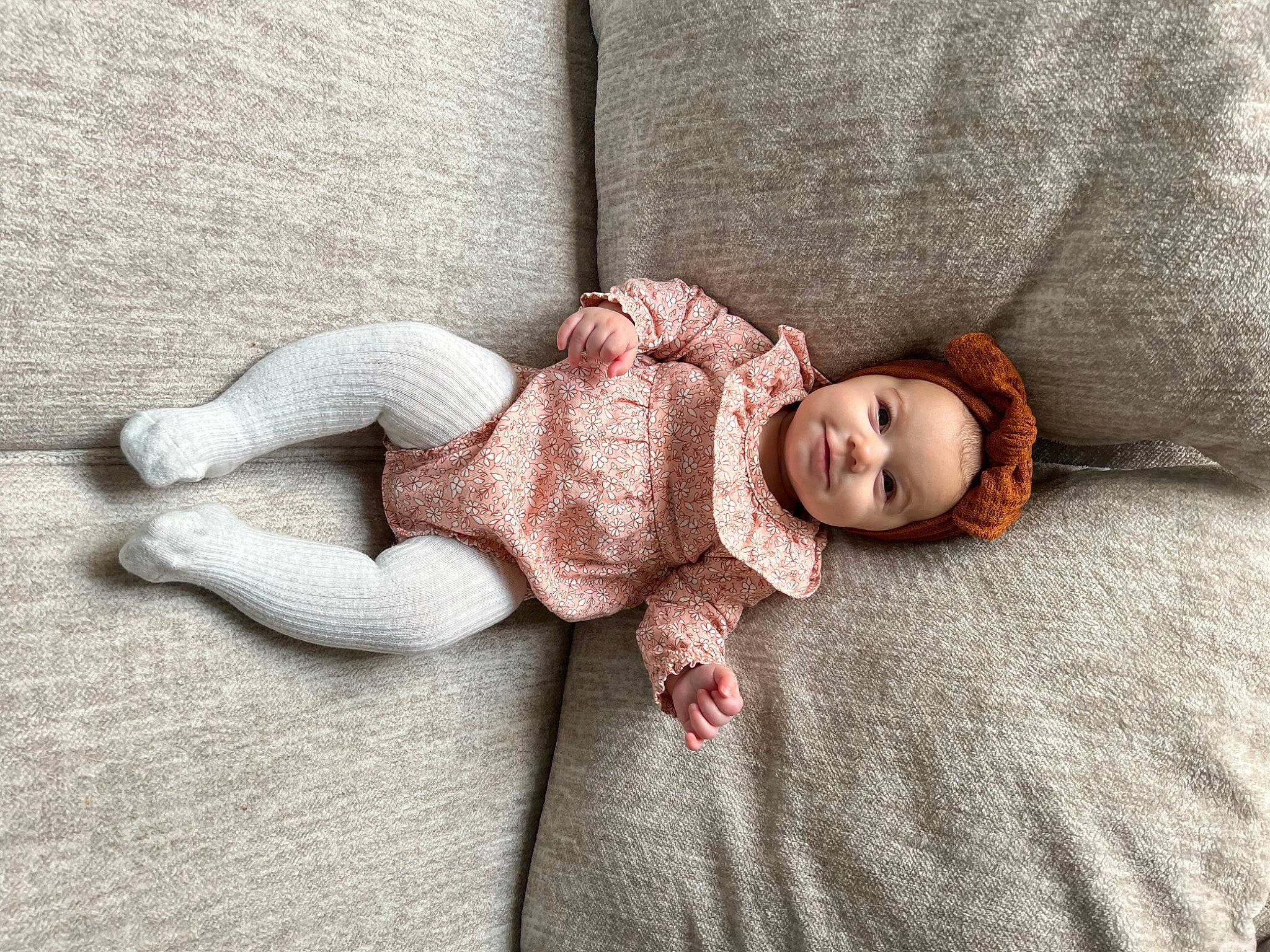 Kali joined the competition — help win amazing prizes! baby, bedding, child, comfort, floor, flooring, foot, fur, grey, hand, headwear, human_leg, linens, mammal, person, sitting, skin, sleeve, toddler, vertebrate