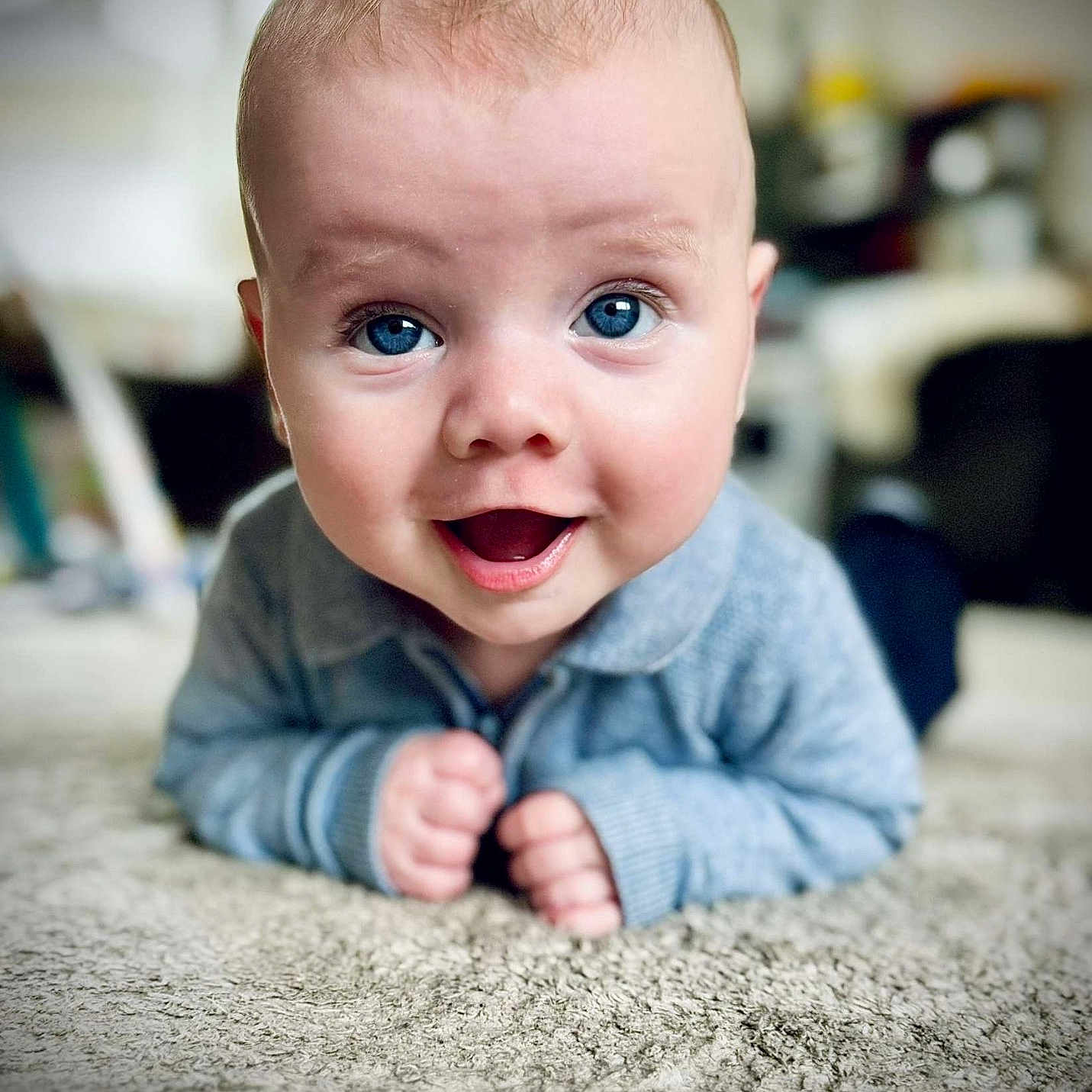 Reuben is registered to the contest to win money with this photo: baby, babylaughing, crawling, face, happy, head, laughing, newborn, person, photography, portrait, sitting, smile