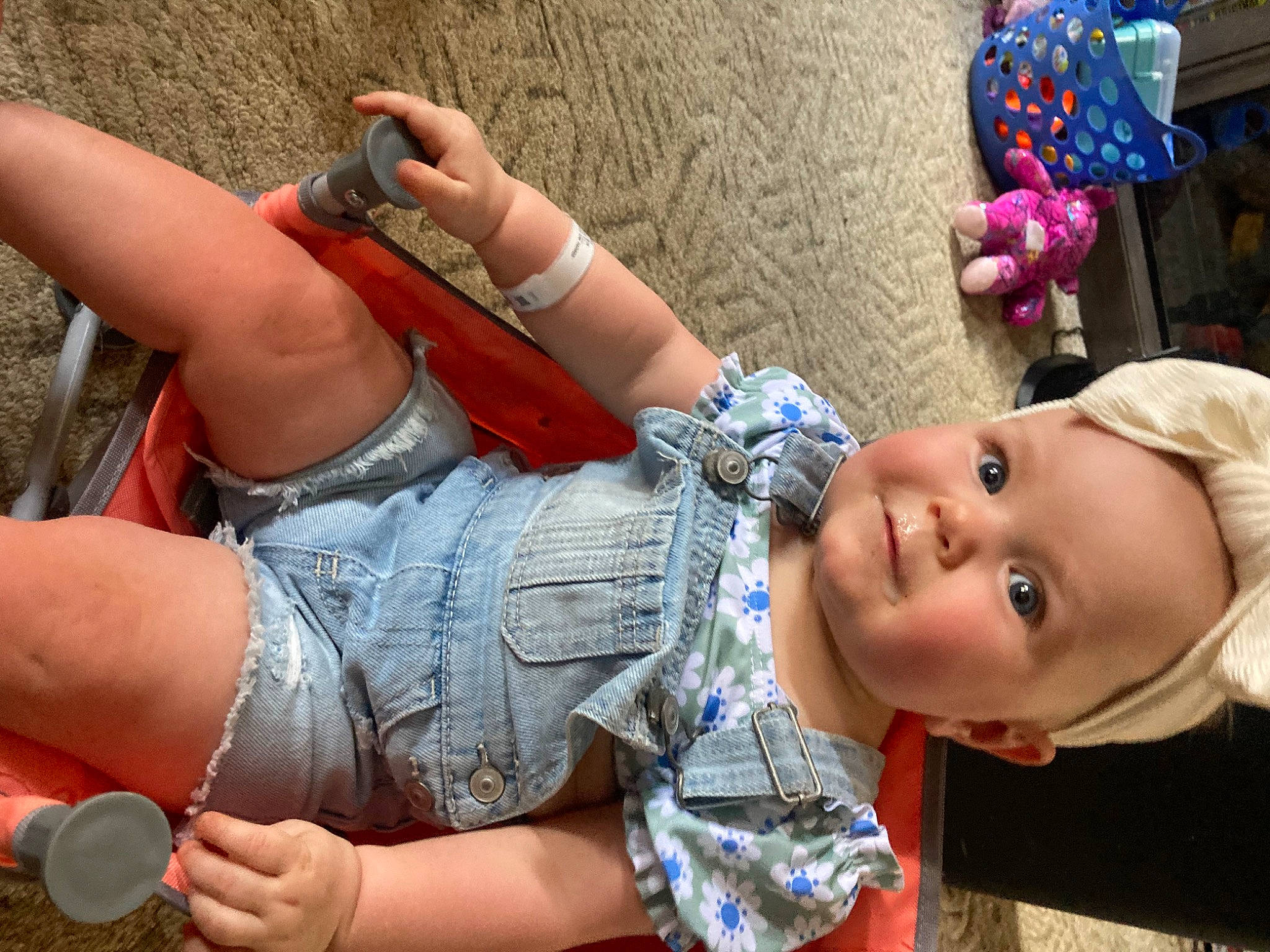 Tessa is registered to the contest to win money with this photo: cool, denim, eyewear, finger, fun, hand, happy, human_body, human_leg, joint, knee, leg, mouth, person, plant, skin, summer, textile, thigh, toddler