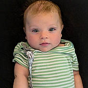 Evian joined the competition — help win amazing prizes! baby, bodypart, clothing, couch, cushion, face, finger, furniture, hand, head, homedecor, newborn, pants, person, photography, portrait, shirt, sitting, sleeve, t_shirt