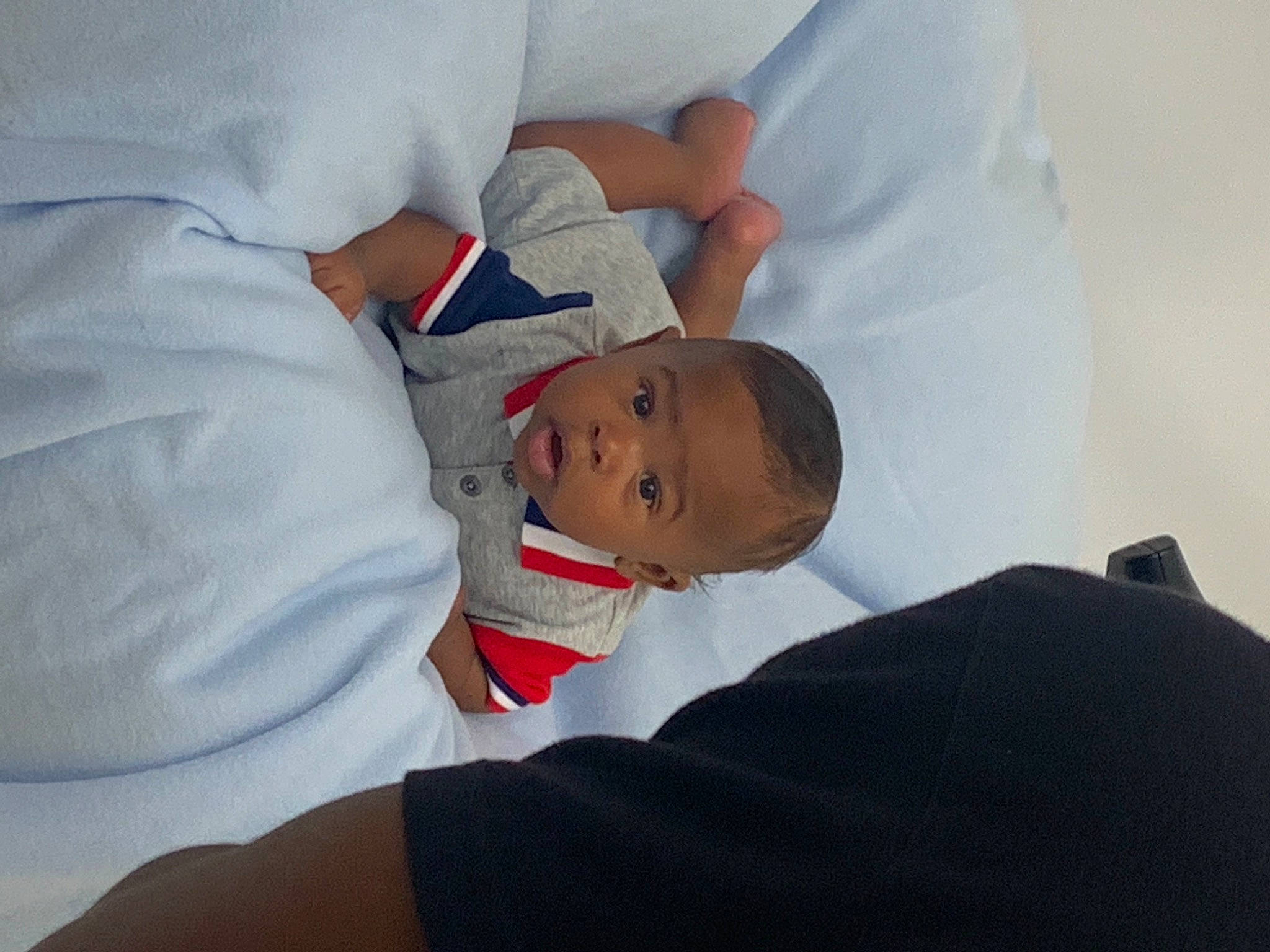 Knowledge is registered to the contest to win money with this photo: baby, baby_products, baby_sleeping, baby_toddler_clothing, bedtime, carmine, child, comfort, elbow, gesture, hat, human_leg, linens, nap, person, sleep, sleeve, toddler