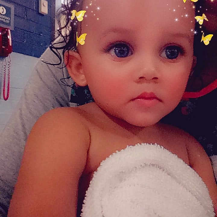 Aminah joined the competition — help win amazing prizes! beauty, cheek, child, eye, forehead, fun, girl, hair_accessory, happiness, head, infant, lip, person, pink, product, skin, smile, toddler, yellow