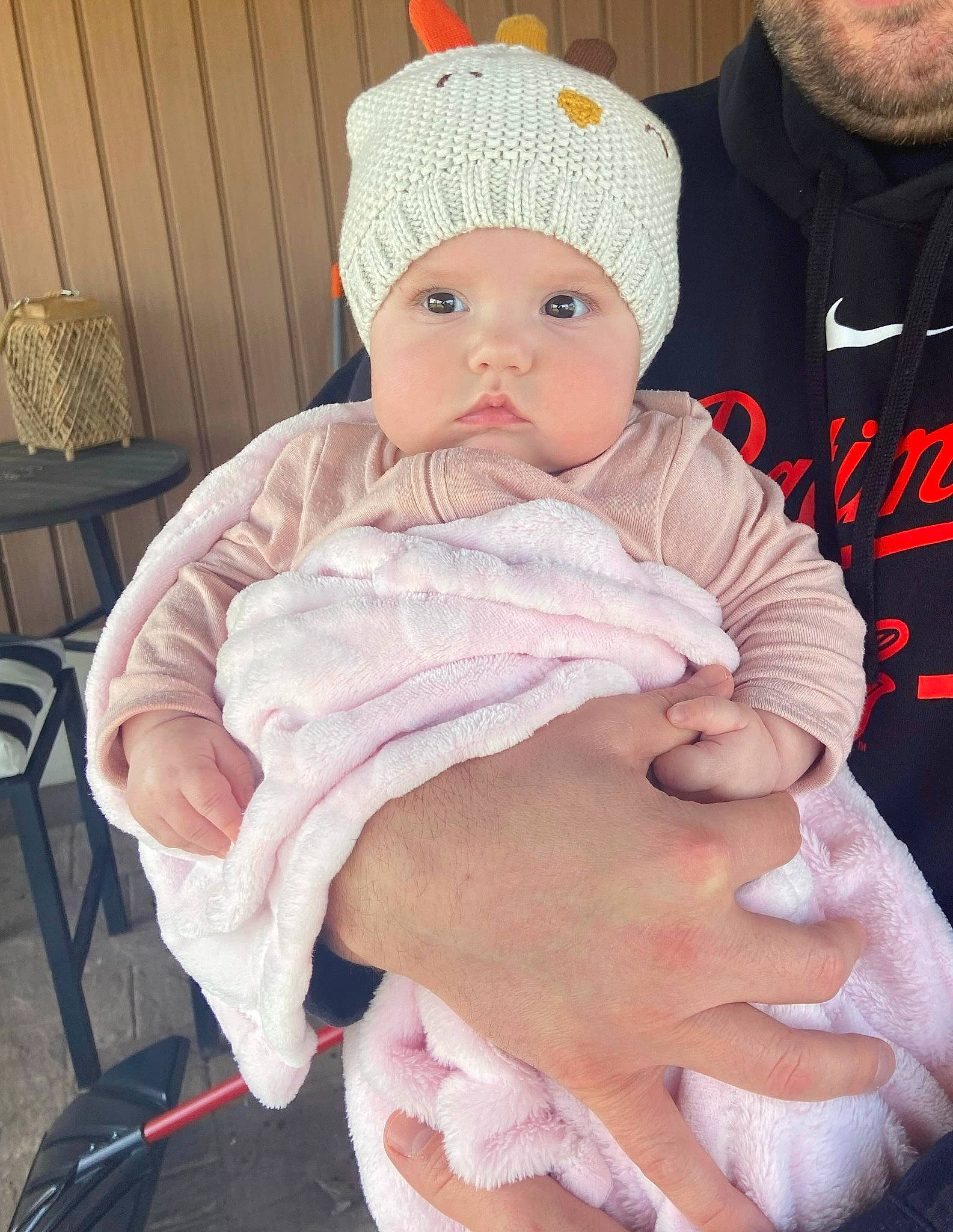 Olivia joined the competition — help win amazing prizes! arm, baby, baby_toddler_clothing, cap, chair, cheek, child, comfort, finger, gesture, headgear, headwear, houseplant, human_body, knit_cap, person, pink, skin, sleeve, thumb