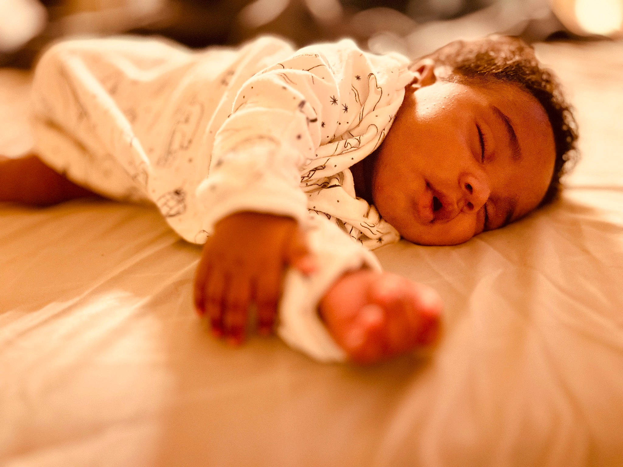 Kyree is registered to the contest to win money with this photo: arm, baby, baby_toddler_clothing, barefoot, comfort, finger, flooring, foot, fun, fur, gesture, happy, hardwood, human_body, human_leg, leg, nose, person, sitting, toddler