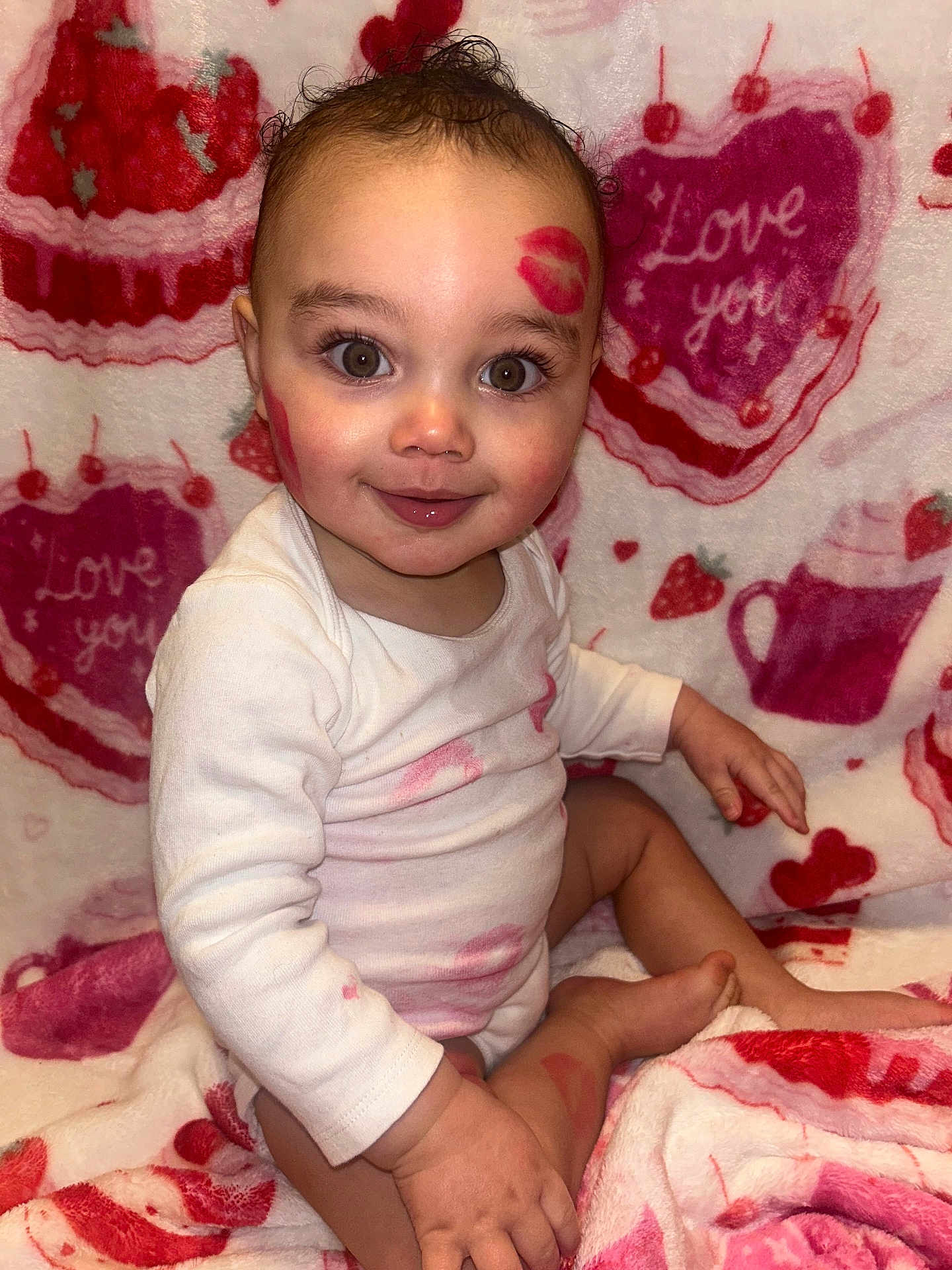 Leighton joined the competition — help win amazing prizes! baby, child, face, smile, eyes, lipstick, kiss_marks, onesie, blanket, valentine, heart, love, cute, sitting, toddler, indoors, skin, hand, foot, portrait