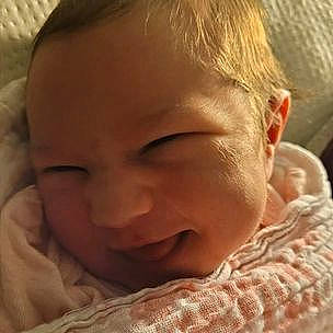 Danielle is registered to the contest to win money with this photo: baby, cheek, chin, comfort, ear, eyebrow, eyelash, forehead, happy, head, human_body, iris, lip, mouth, neck, nose, organ, person, skin, smile