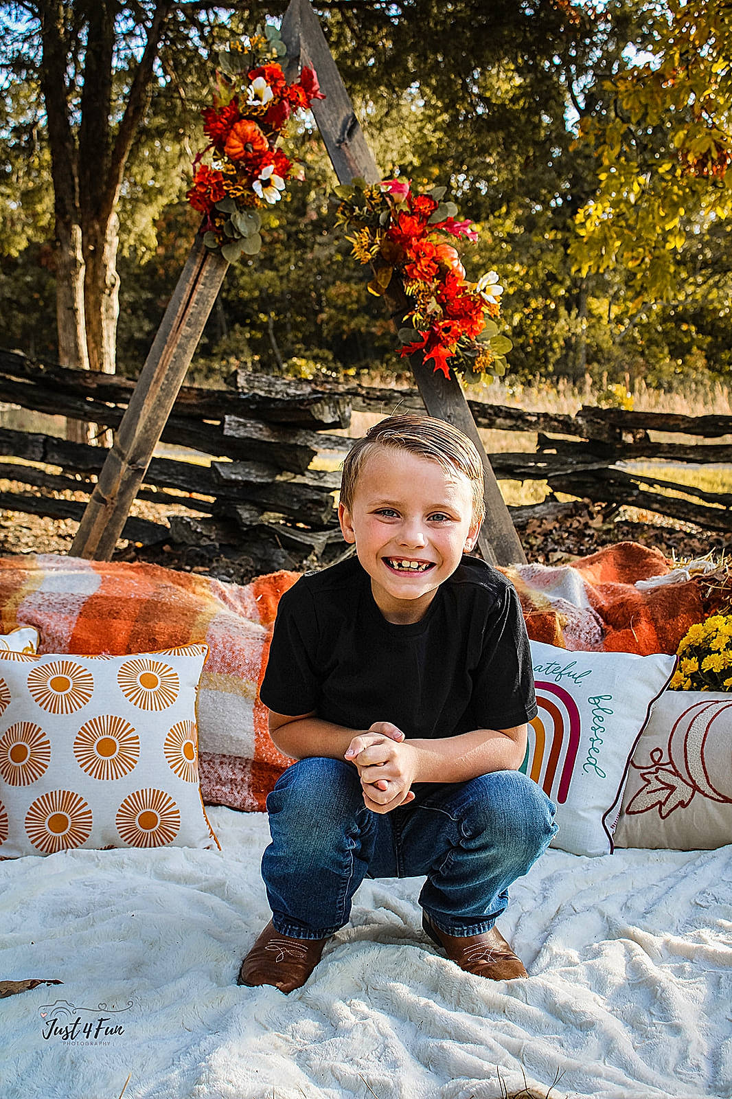 Kayson is registered to the contest to win money with this photo: autumn, beauty, child, denim, flash_photography, fun, grass, happy, joy, leaf, leisure, orange, people_in_nature, person, portrait_photography, recreation, sitting, smile, toddler, tree