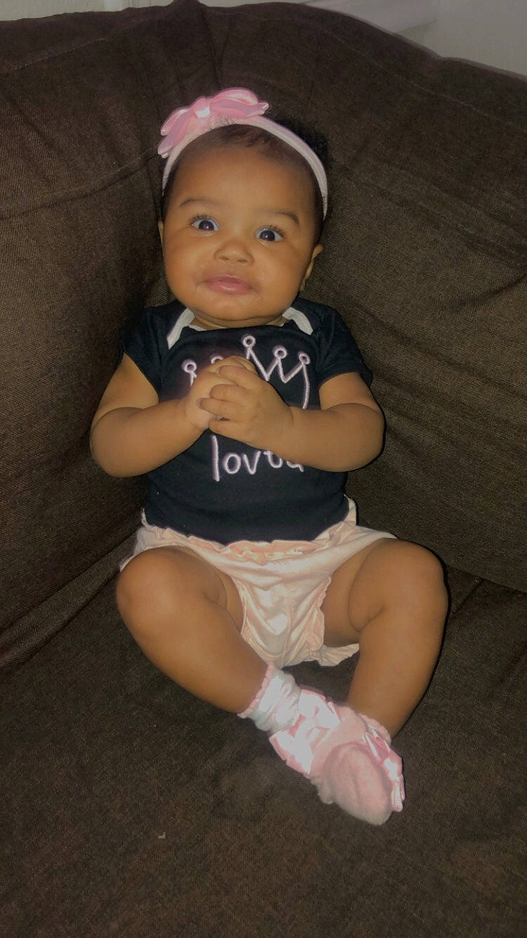 Zendaya joined the competition — help win amazing prizes! baby, baby_toddler_clothing, cheek, child, comfort, dress, elbow, face, flash_photography, foot, hat, human_leg, iris, knee, person, sitting, sleeve, smile, t_shirt, thigh