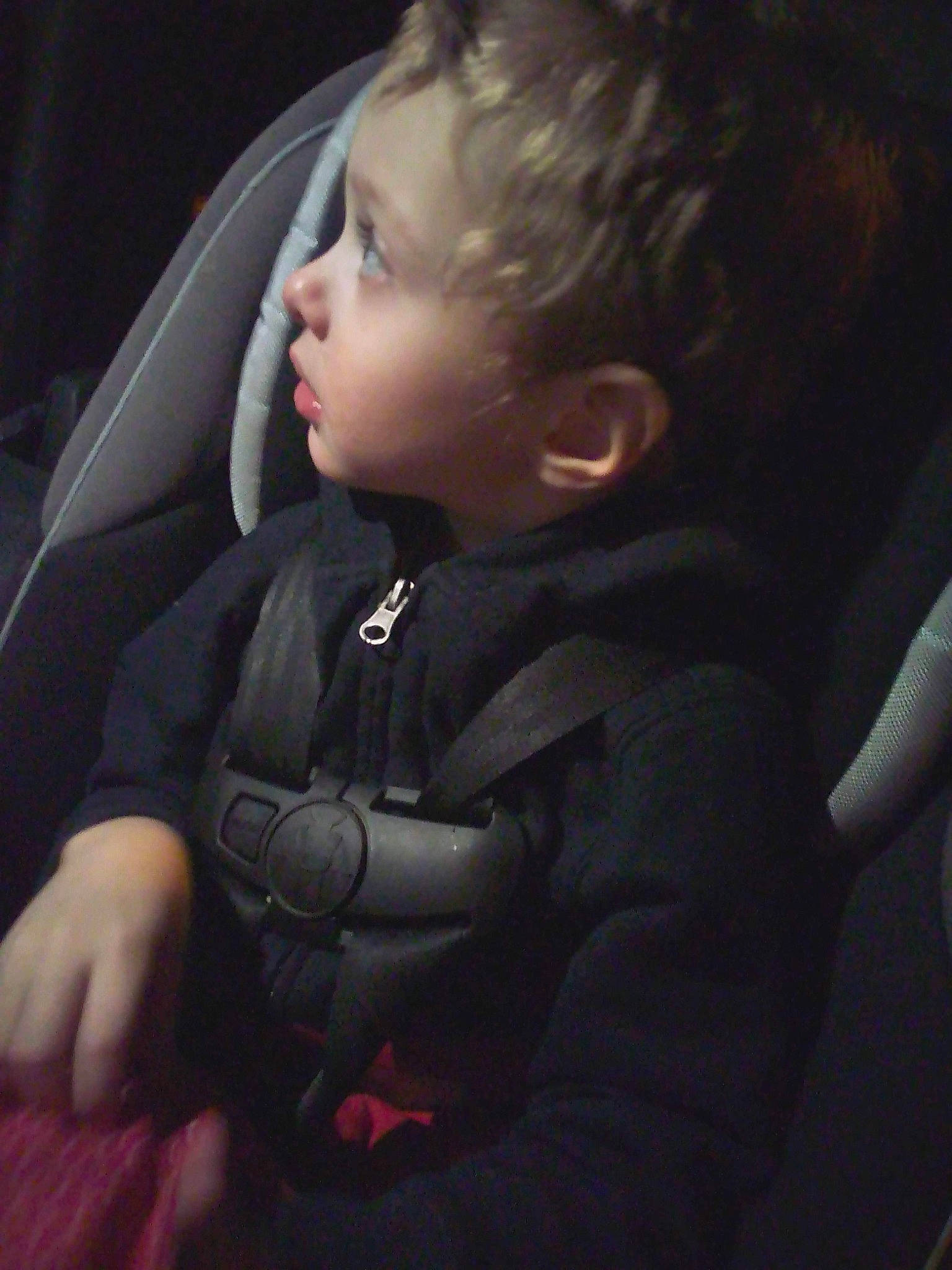 Tayler is registered to the contest to win money with this photo: arm, automotive_design, automotive_exterior, baby_carriage, car_seat, car_seat_cover, cheek, comfort, cool, eyebrow, flash_photography, head_restraint, mouth, nose, person, personal_luxury_car, skin, sleeve, tints_and_shades, toddler