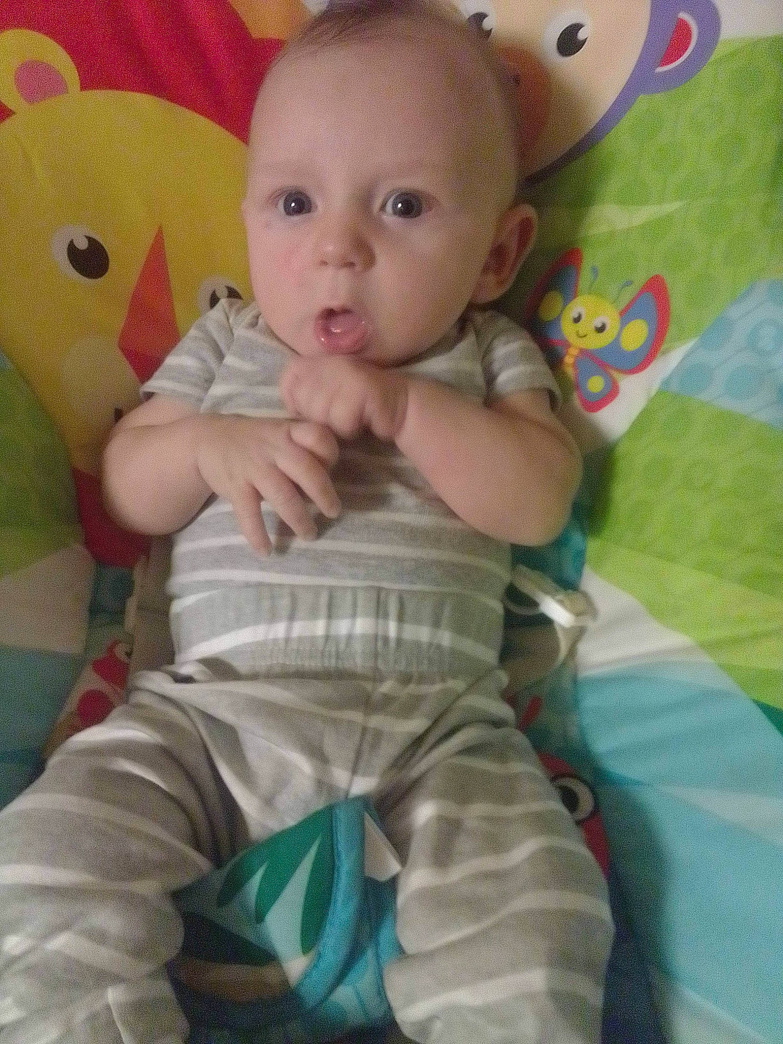 James is registered to the contest to win money with this photo: baby, baby_toddler_clothing, cheek, child, comfort, eye, face, finger, happy, head, iris, mammal, nose, organ, person, pink, product, skin, sleeve, textile