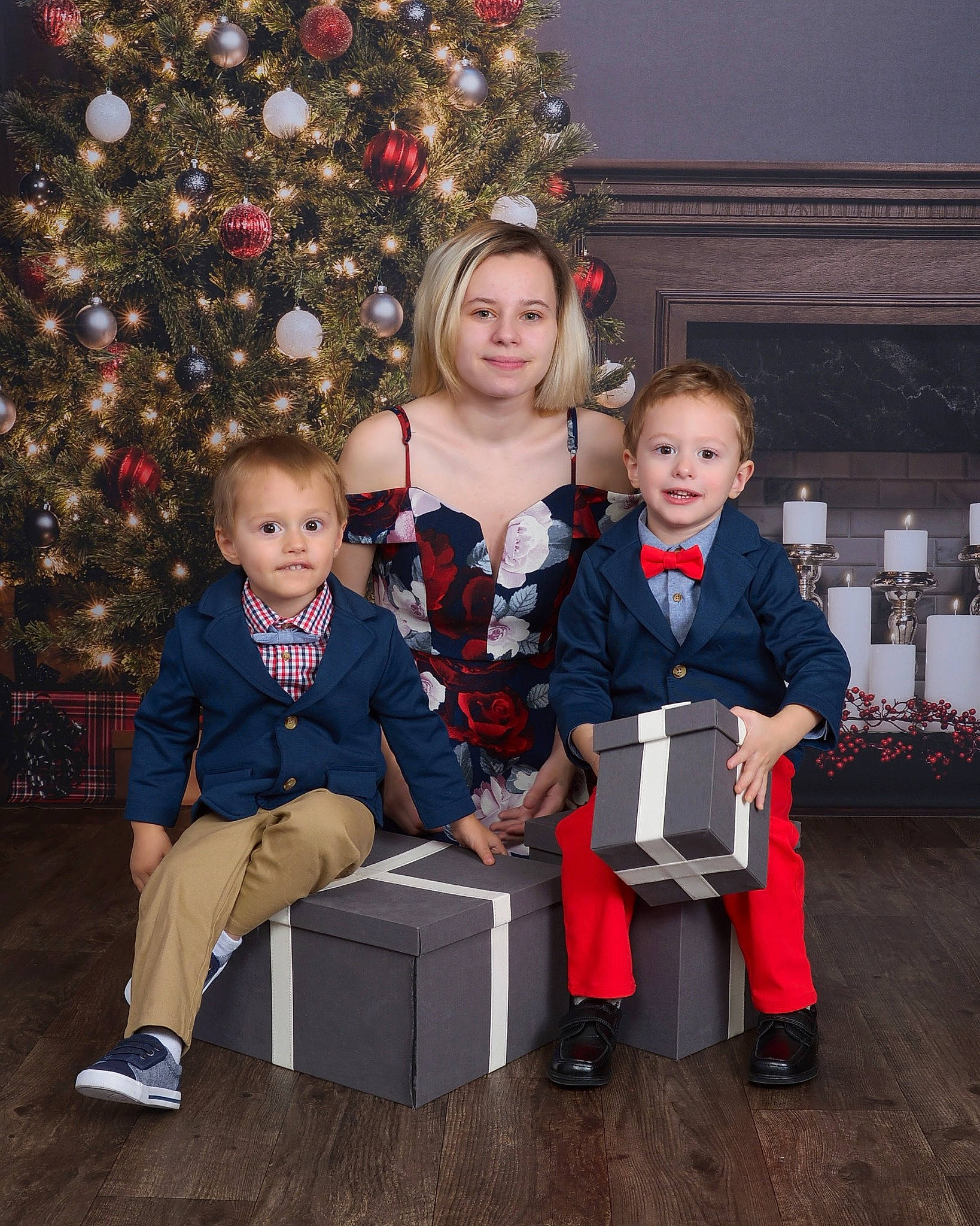 Payton joined the competition — help win amazing prizes! child, christmas, christmas_decoration, christmas_eve, christmas_ornament, christmas_tree, event, fun, happy, holiday, holiday_ornament, joy, lap, ornament, person, plant, sitting, smile, sneakers, standing