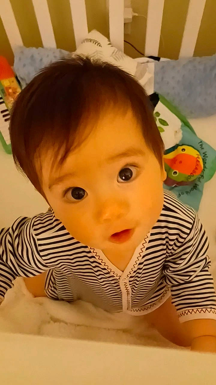 Ethan is registered to the contest to win money with this photo: baby, baby_toddler_clothing, cheek, child, chin, eyebrow, eyelash, facial_expression, forehead, hairstyle, happy, iris, lip, mouth, nose, person, room, skin, surprise, toddler