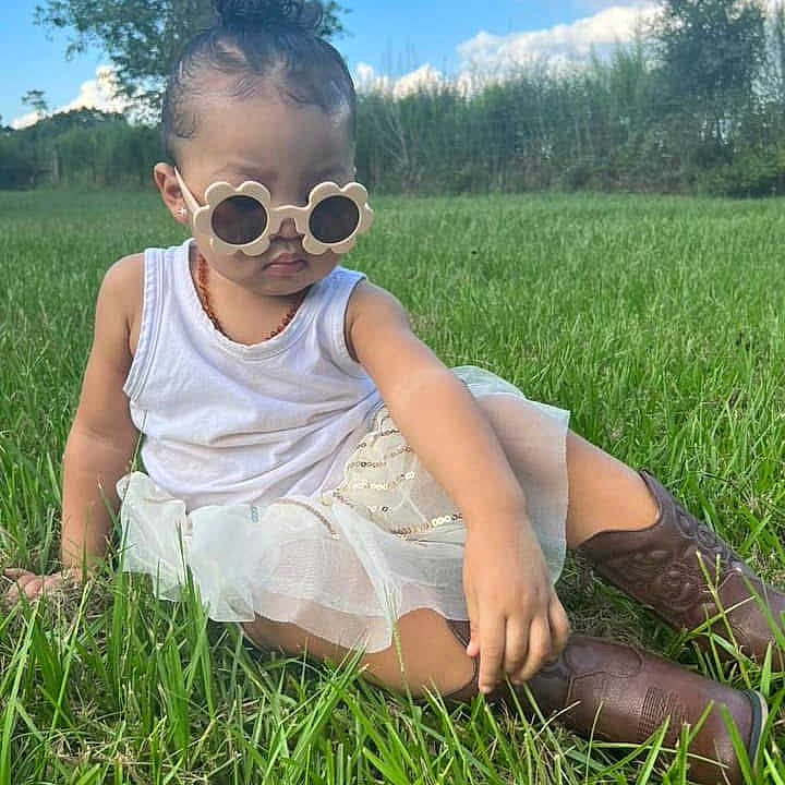Nailana is registered to the contest to win money with this photo: accessories, blackhair, brownhair, clothing, face, grass, hair, head, lawn, mohawkhairstyle, mortarshell, outdoors, person, photography, plant, portrait, sitting, sleeve, sunglasses, weapon