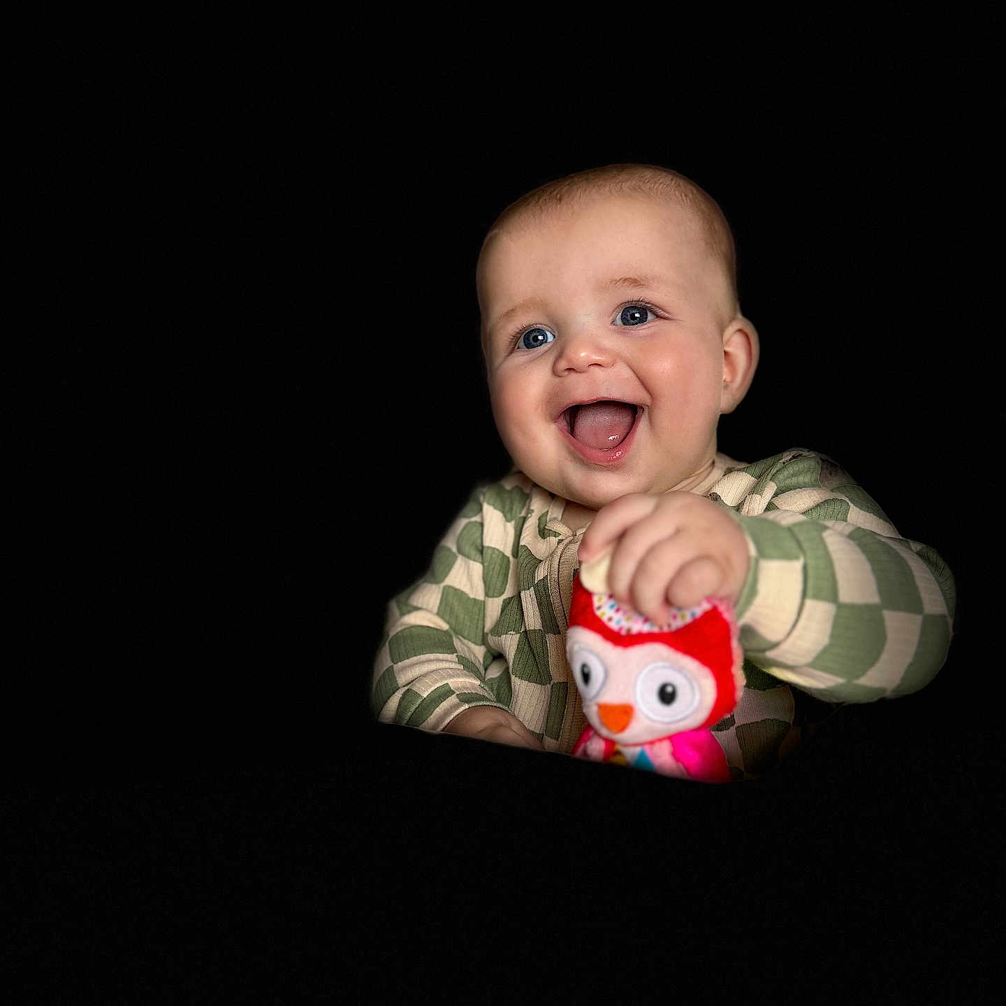 Hugo joined the competition — help win amazing prizes! baby, blue_eyes, child, cute, dark_background, expression, face, green_clothing, hand, happy, infant, isolated, joyful, long_sleeve, owl_toy, person, playful, plush_toy, portrait, smiling