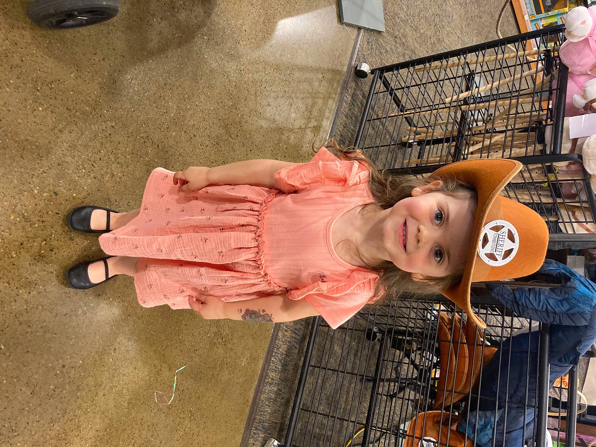Quinn joined the competition — help win amazing prizes! baby, baby_carriage, baby_products, baby_toddler_clothing, cart, child, flesh, flooring, foot, fun, hat, headwear, human_leg, joy, person, pink, sandal, sitting, toddler