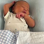 Emmanuel joined the competition — help win amazing prizes! newborn, baby, sleeping, blanket, infant, cozy, rest, peaceful, cute, child, soft, comfort, lying_down, portrait, clothing, bed, face, hand, skin, relaxation