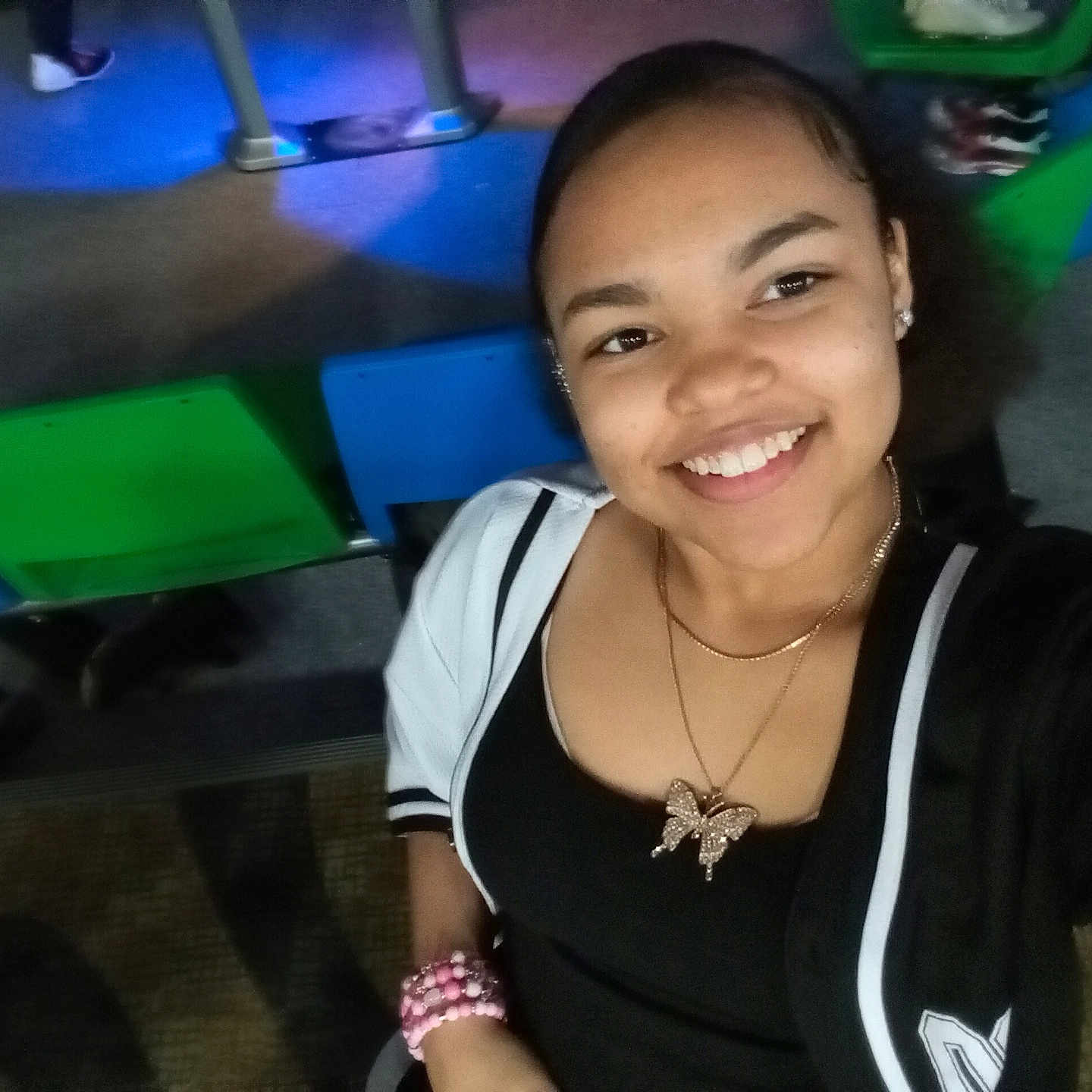 Ahmya Mitchell joined the competition — help win amazing prizes! accessories, adult, bodypart, earbuds, earring, electronics, face, female, finger, hand, happy, head, jewelry, necklace, pendant, person, photography, portrait, smile, woman