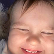 Nicklas is registered to the contest to win money with this photo: baby, smile, face, child, closeup, joy, happiness, infant, cute, skin, cheeks, mouth, teeth, expression, person, young, head, hair, indoors, portrait