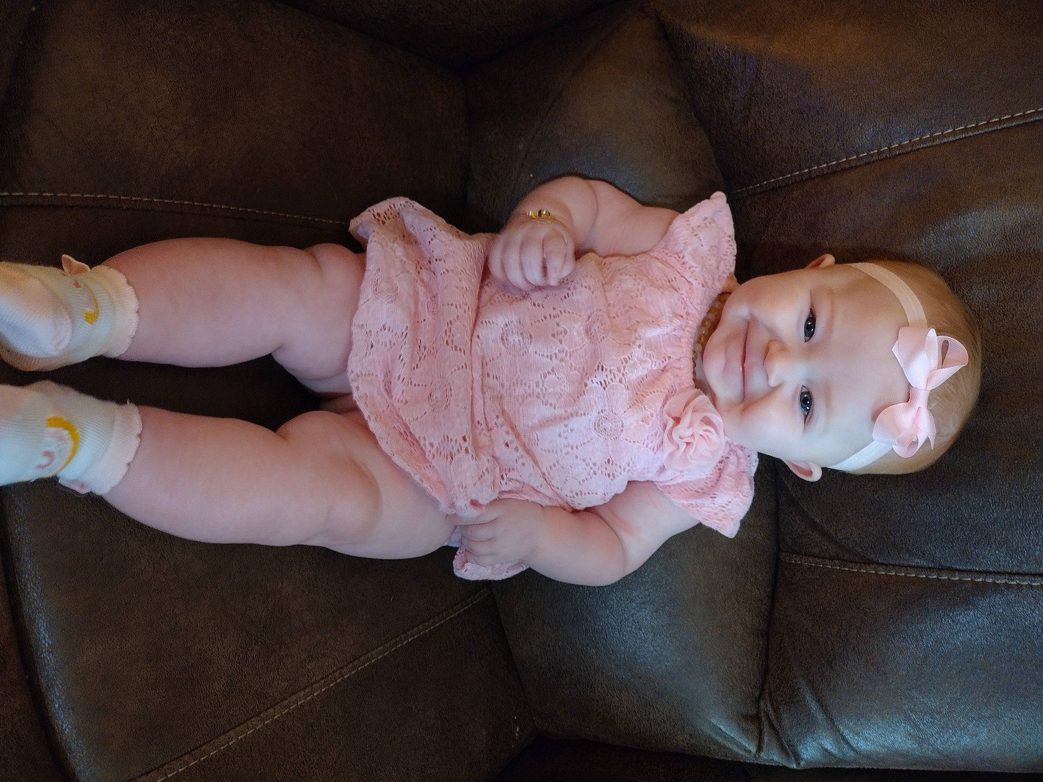 Raelynn joined the competition — help win amazing prizes! baby, baby_products, baby_toddler_clothing, cheek, child, comfort, eye, finger, hand, head, headgear, iris, nail, person, pink, sitting, skin, sleeve, toddler, wood