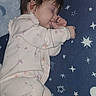 baby, blanket, blue, child, closeup, cozy, cute, face, hair, hand, indoors, infant, pajamas, pattern, peaceful, plush_toy, rest, sleeping, soft_toys, stars