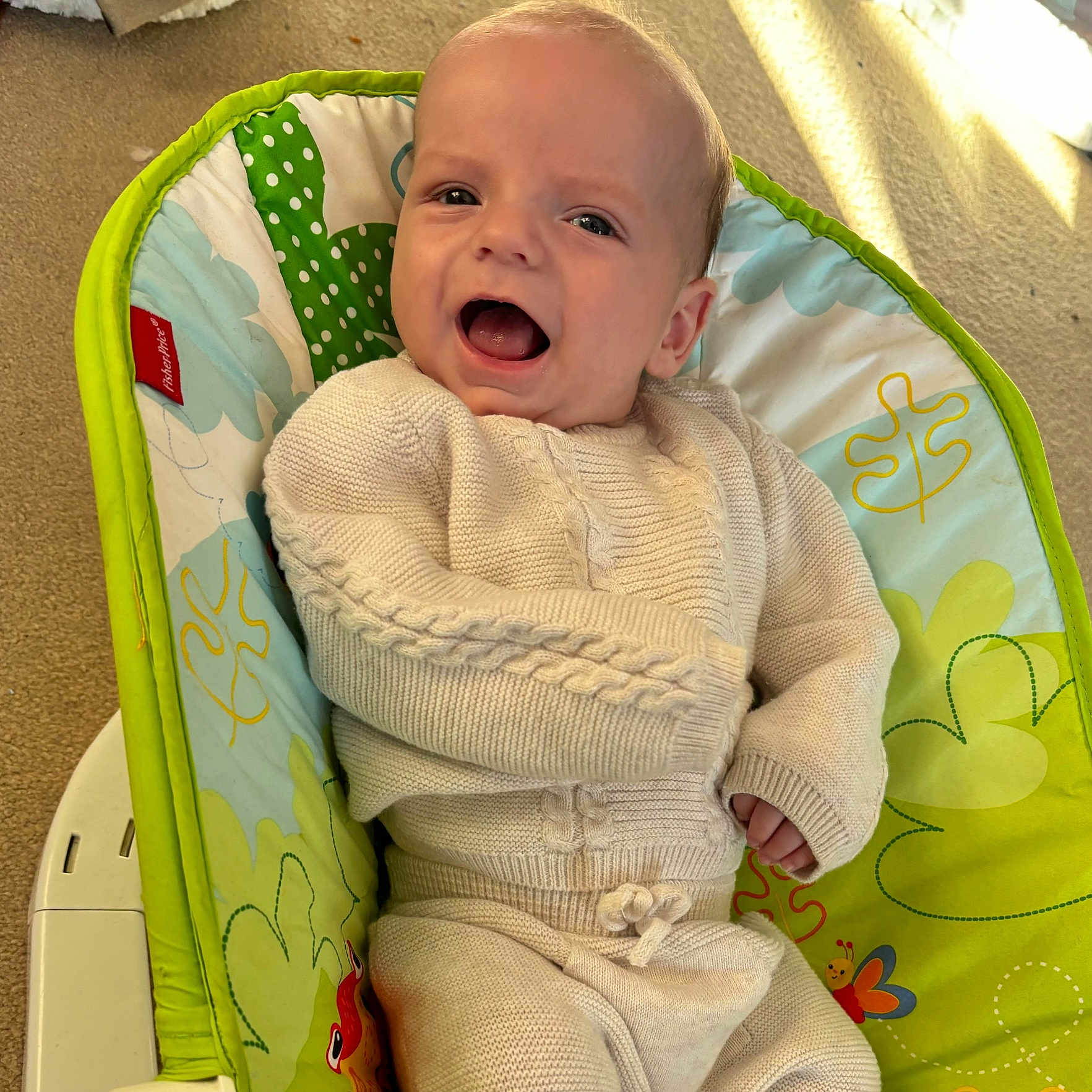 Vinnie joined the competition — help win amazing prizes! baby, babylaughing, bed, blanket, clothing, crib, cushion, face, furniture, happy, head, homedecor, infantbed, knitwear, laughing, person, photography, portrait, quilt, sweater