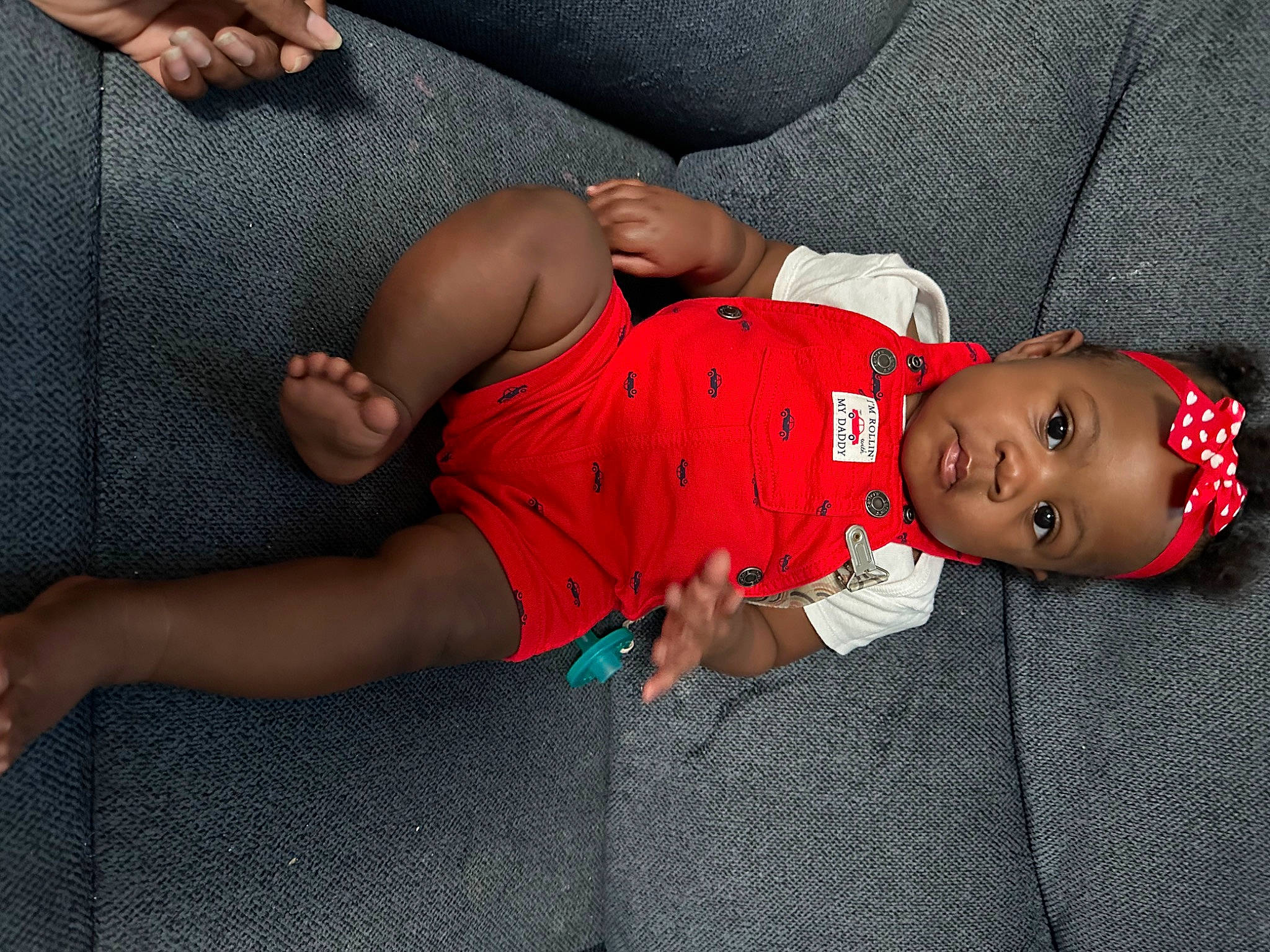Laylani joined the competition — help win amazing prizes! abdomen, baby, baby_toddler_clothing, chest, child, comfort, elbow, finger, foot, hat, human_leg, joint, knee, leg, mouth, person, sleeve, t_shirt, thigh, toddler