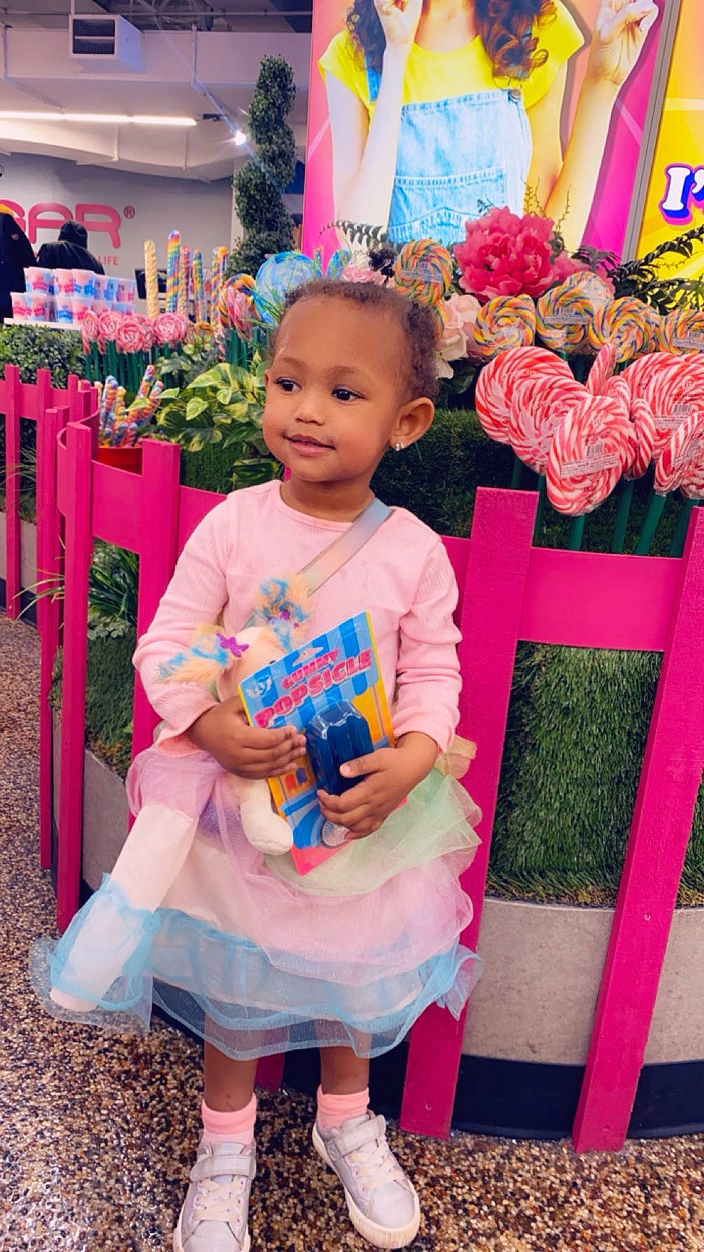Nakia is registered to the contest to win money with this photo: baby_toddler_clothing, bag, child, costume, event, flower, fun, happy, joy, leisure, magenta, party, pattern, peach, person, pink, plant, purple, red, sock