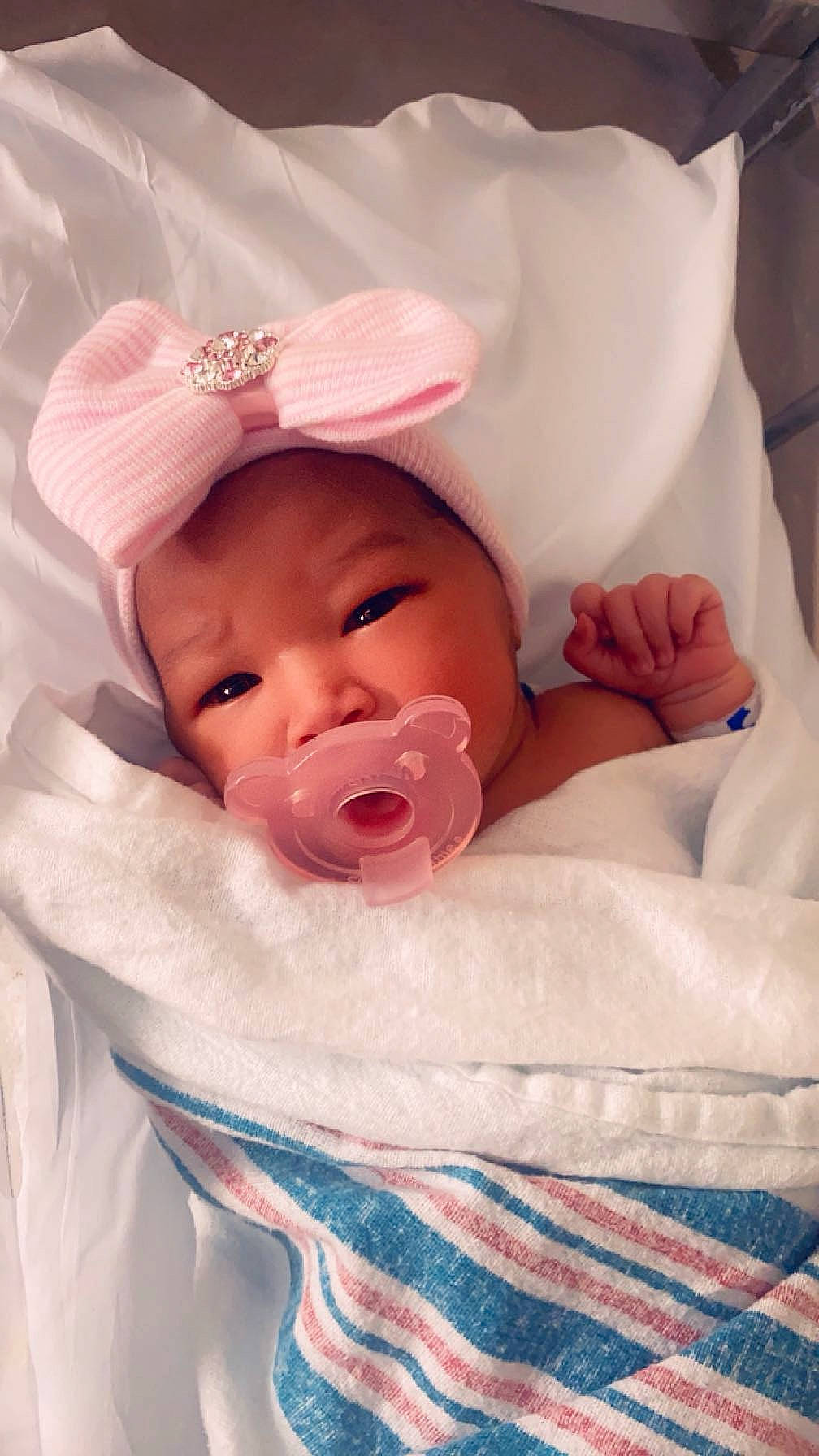 Naylani joined the competition — help win amazing prizes! baby, baby_products, baby_sleeping, baby_toddler_clothing, cheek, child, chin, comfort, event, face, facial_expression, happy, hat, headwear, linens, lip, mouth, person, pink, skin