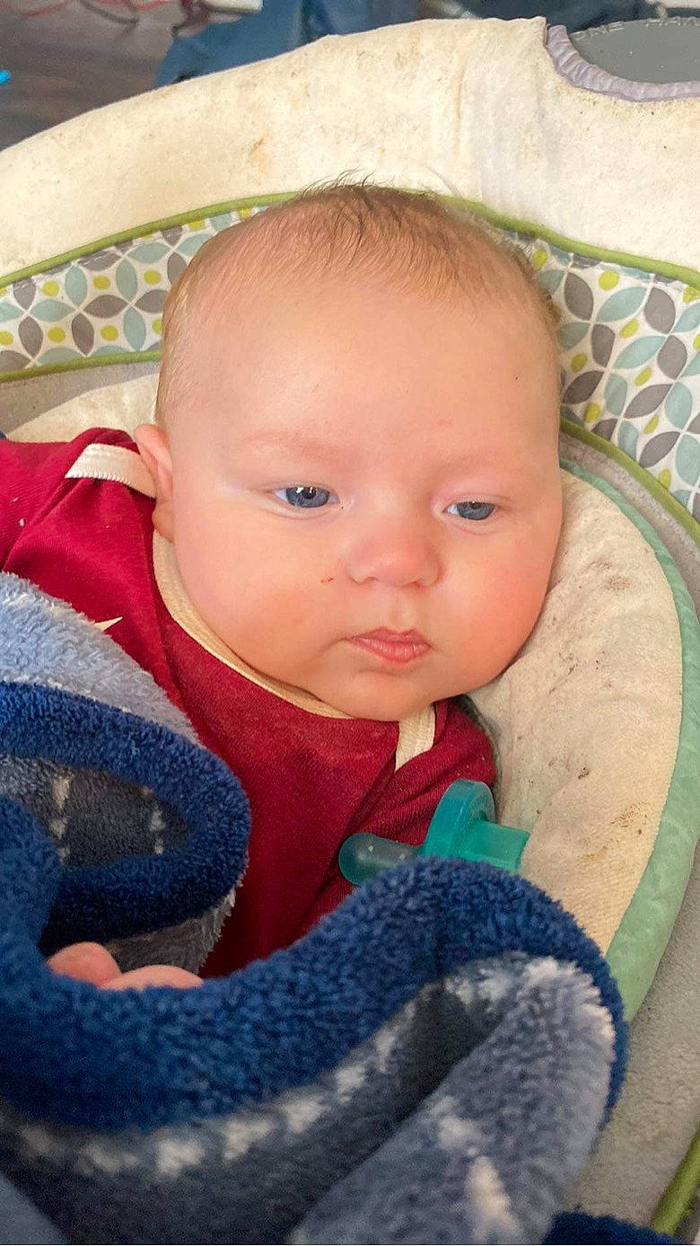 Elijah joined the competition — help win amazing prizes! baby, baby_products, baby_safety, baby_toddler_clothing, cheek, child, chin, comfort, electric_blue, eye, hairstyle, iris, linens, nail, nose, person, sitting, skin, toddler