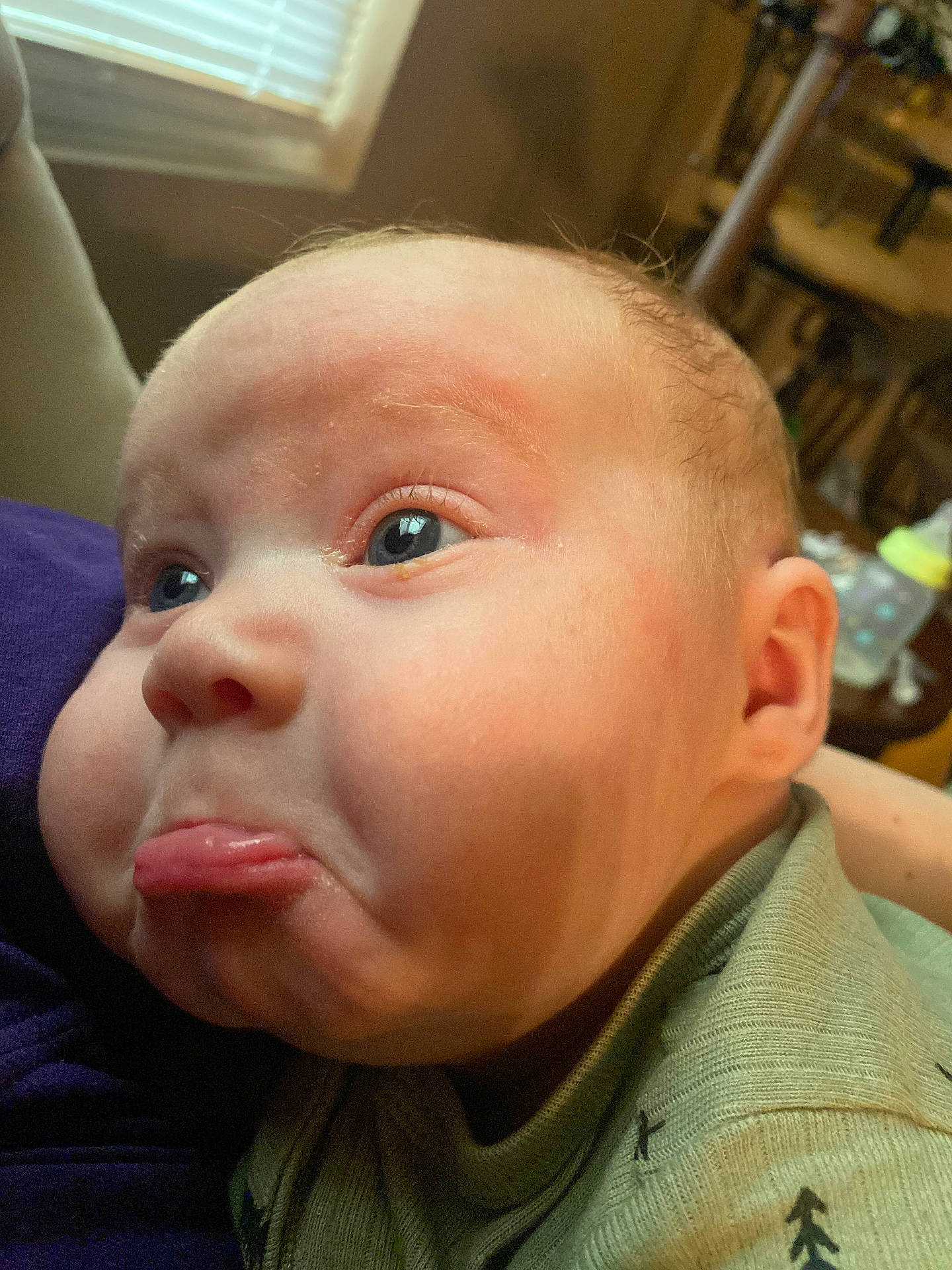Colton joined the competition — help win amazing prizes! accessories, baby, bodypart, clothing, couch, ear, face, frown, furniture, head, mouth, newborn, person, photography, portrait, sad, selfie, skin, t_shirt, tongue